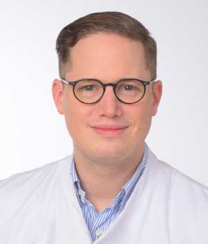 Dr. Dominik Schlarb